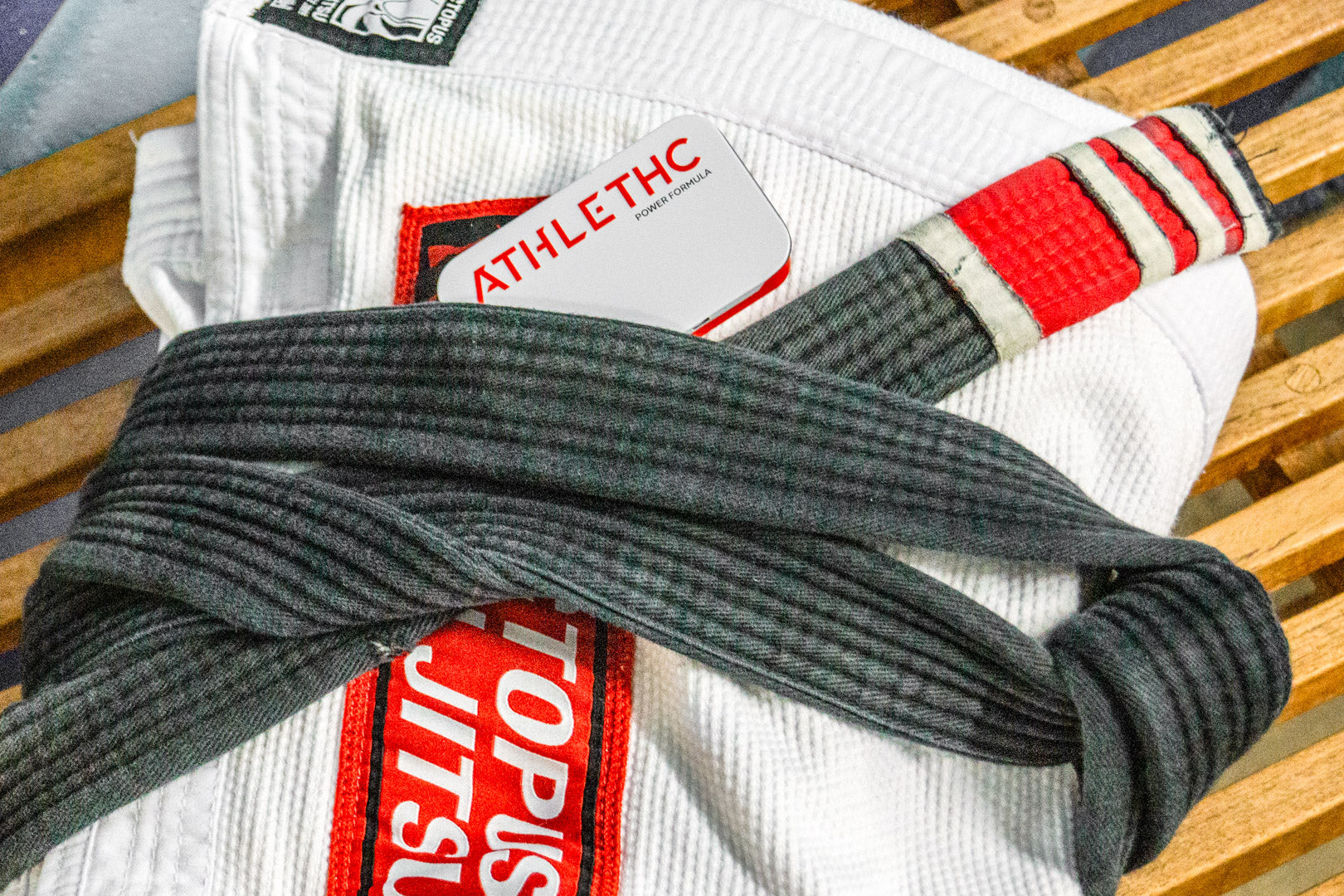 Athletic THC Power Formula Mints on top of a Brazilian Jiu Jitsu Gi